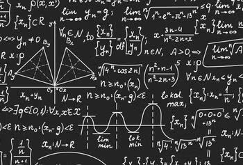 Concept of calculations with chalk on a whiteboard